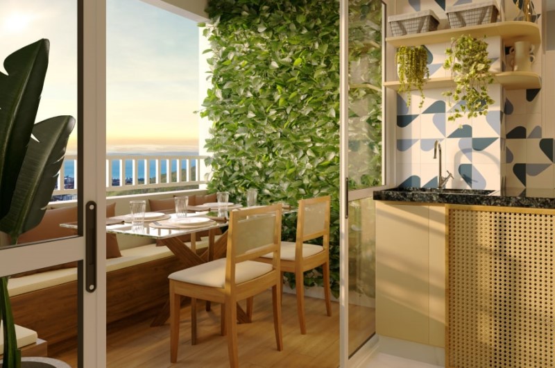 Apartamento com varanda | Varanda decorada com mesa de jantar, plantas verticais e bancada | Onde Morar | Blog da Tenda